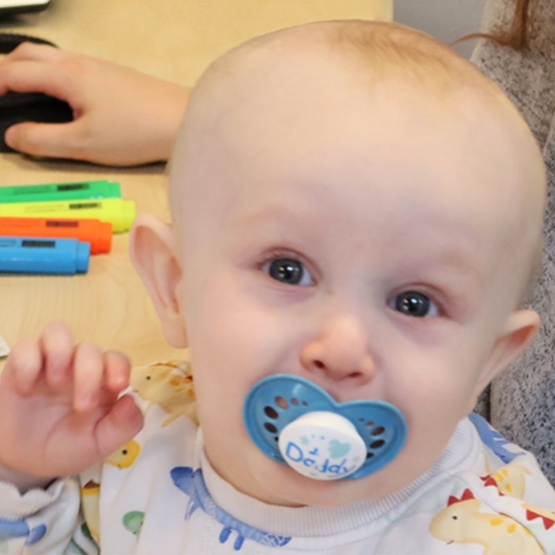Archie smiling during a visit to the Frame Build UK estimating office